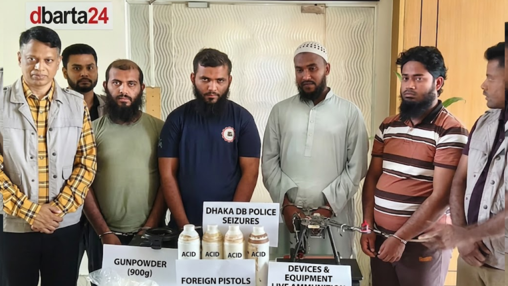 Four arrested suspects standing with seized firearms, drones, and military gear in Dhaka DB office