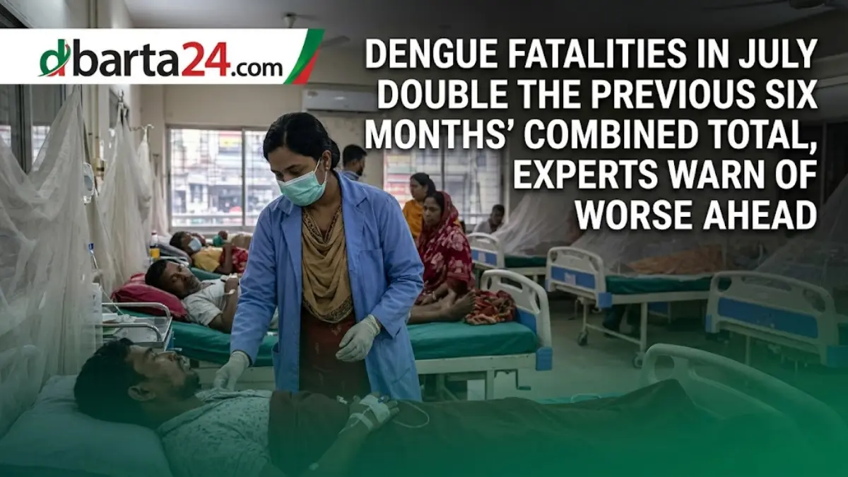Health workers treating a dengue patient in a hospital ward in Bangladesh amidst a rising outbreak.