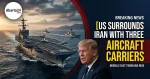 US aircraft carrier sailing through open waters during Middle East deployment